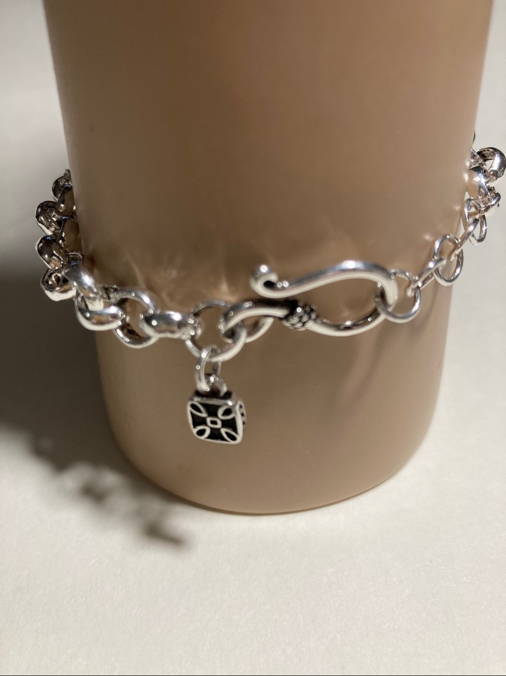 JTV Sterling Silver Chain Bracelet With Three Small Charms 
7 1/4 Inches Long